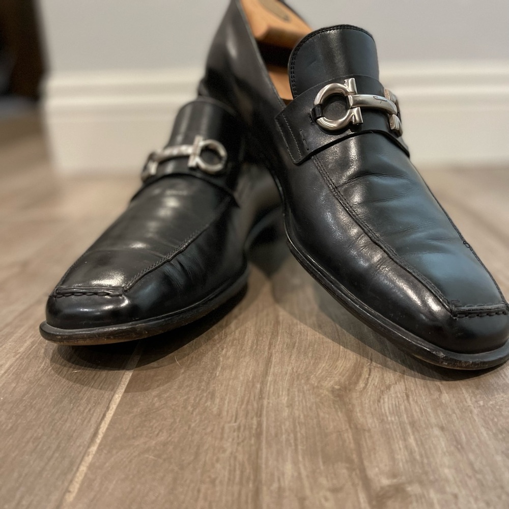 Salvador Ferragamo black calf loafers with medallion